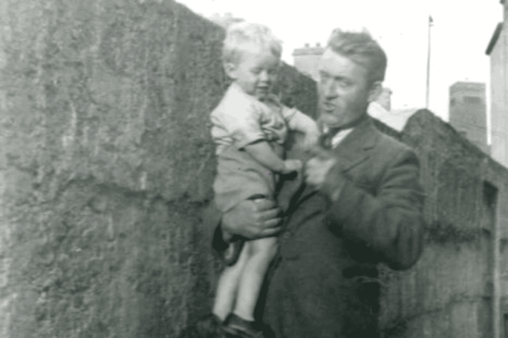 About Kelly's Btuchers. We share our story and a look back at the beginning of Kelly's butchers to today. A photo of Sean in his fathers arms as a young child.